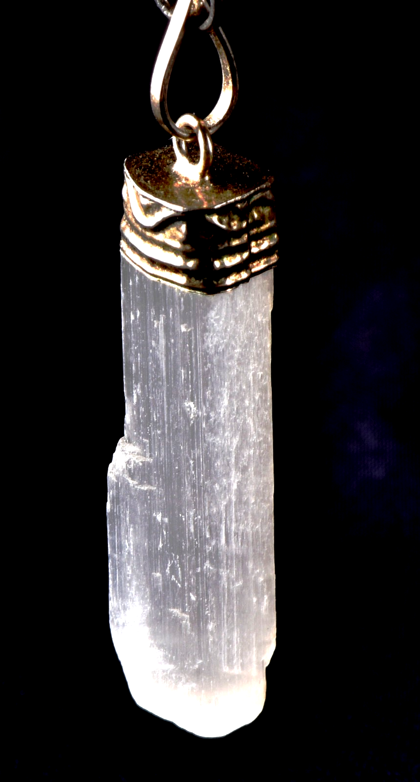 Selenite  pendant  promotes peace and calm, mental clarity, and well-being. 8263