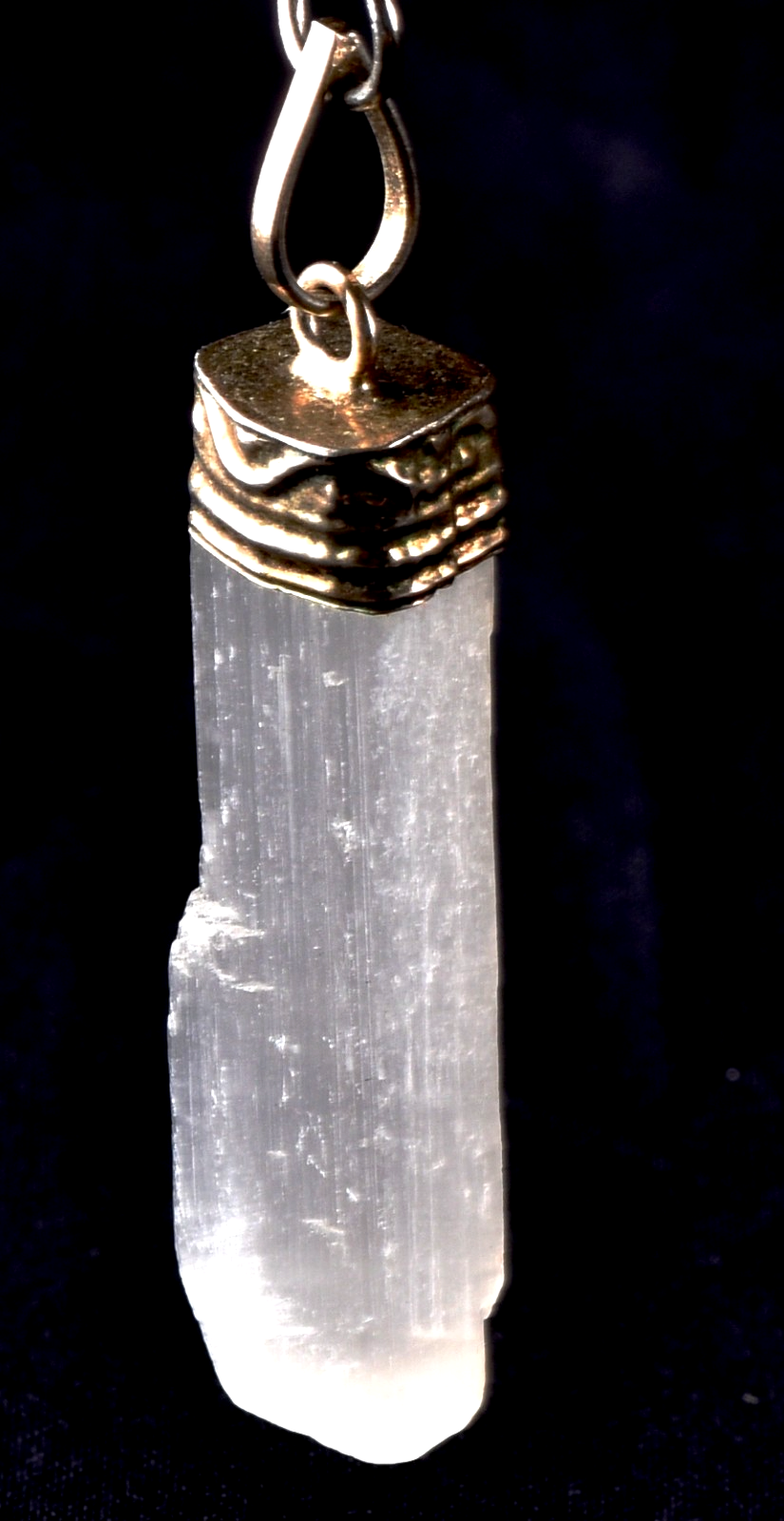 Selenite  pendant  promotes peace and calm, mental clarity, and well-being. 8263