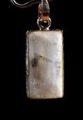 Moon stone chatoyant  tiny pendant  achieve inner growth and strength.  1034
