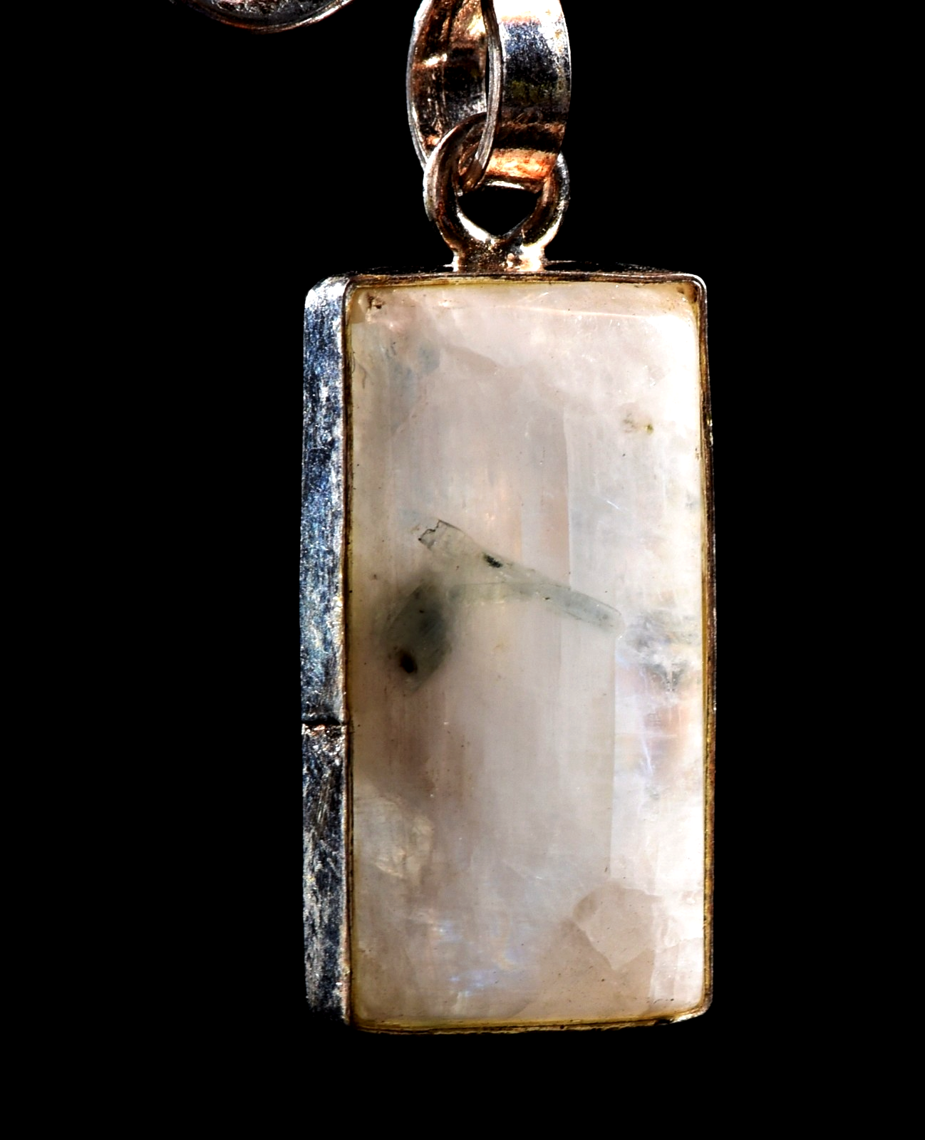 Moon stone chatoyant  tiny pendant  achieve inner growth and strength.  1034