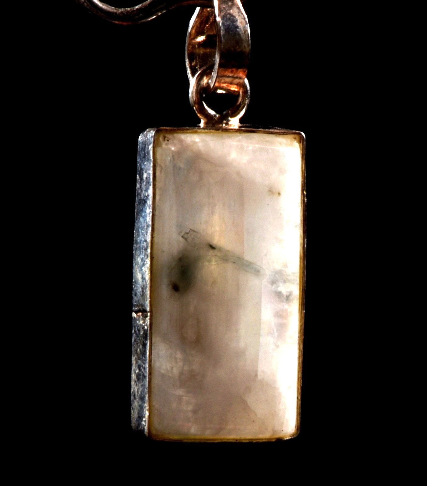 Moon stone chatoyant  tiny pendant  achieve inner growth and strength.  1034