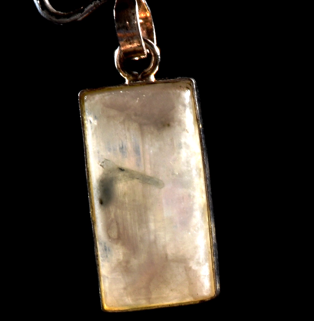 Moon stone chatoyant  tiny pendant  achieve inner growth and strength.  1034