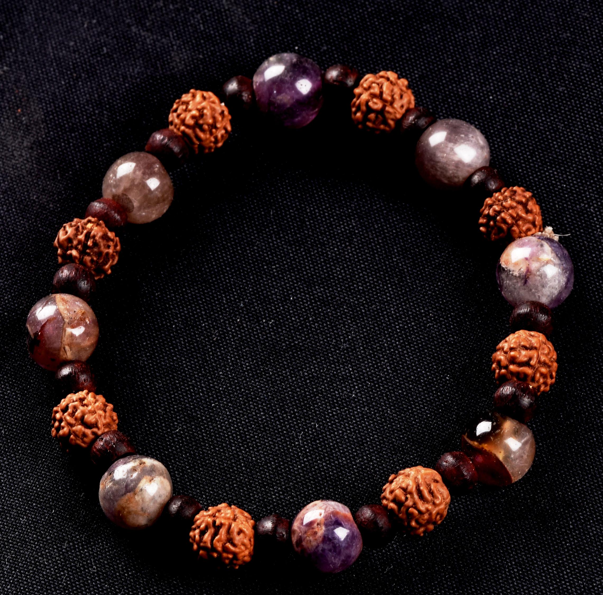 Super seven 7 melody stone bracelet with red sandalwood/rudrakha beads Purifies, balances energizes all of the Chakras and Auric bodies 7077