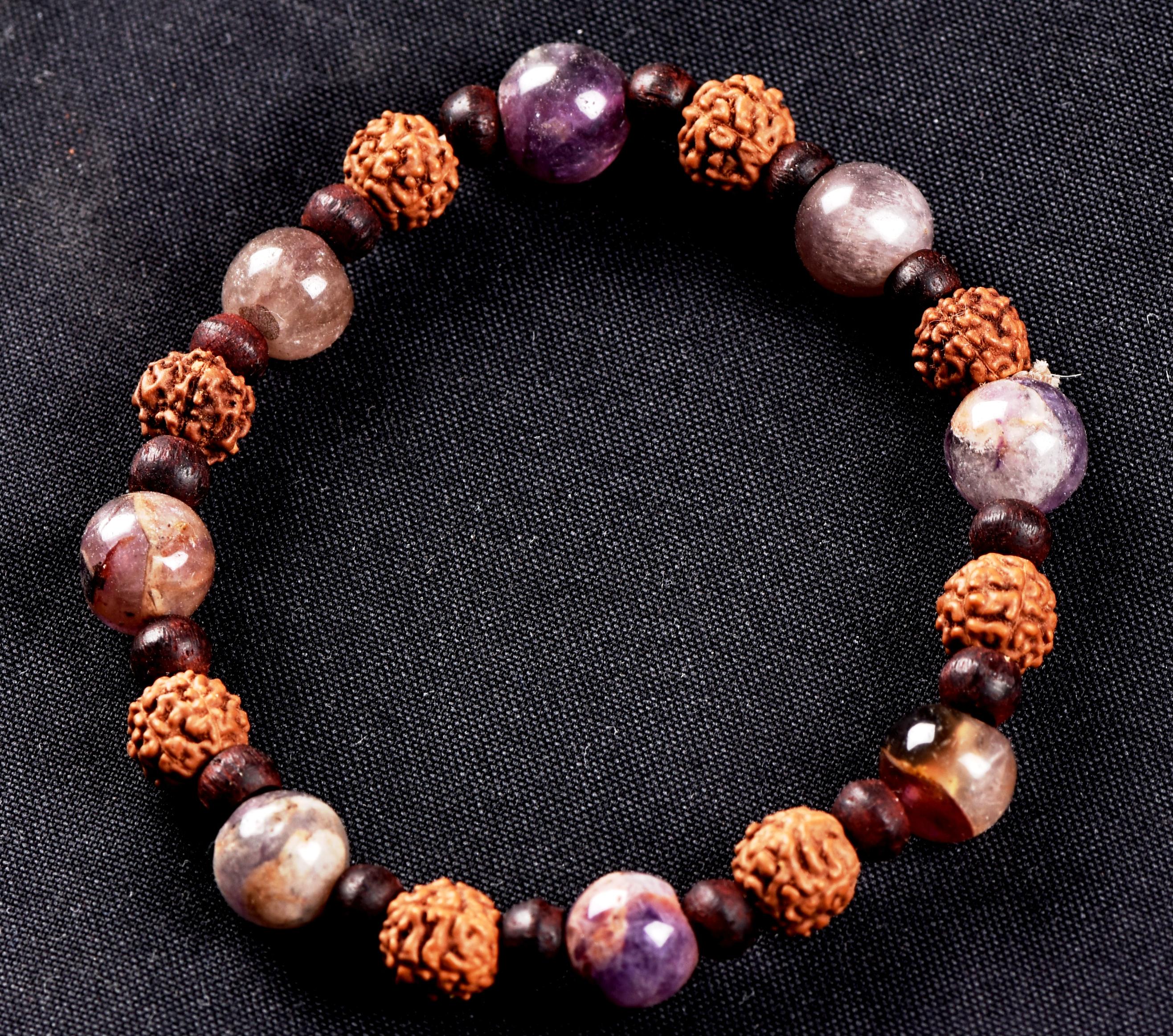 Super seven 7 melody stone bracelet with red sandalwood/rudrakha beads Purifies, balances energizes all of the Chakras and Auric bodies 7077
