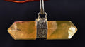 Calcite  Natural  protecting, grounding and centering double terminated pendant   7306