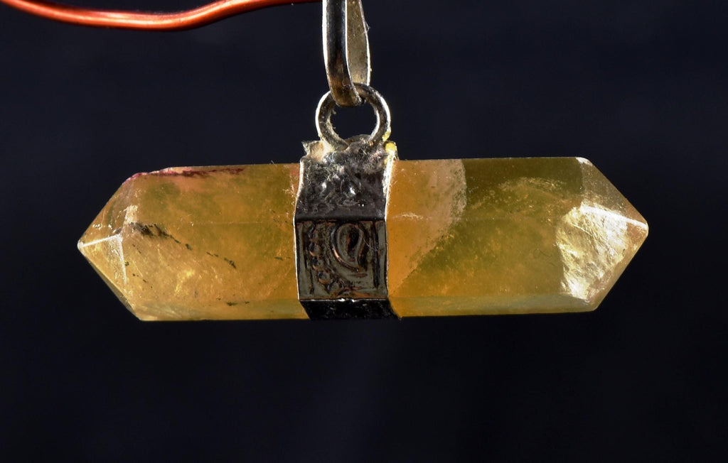 Calcite  Natural  protecting, grounding and centering double terminated pendant   7306