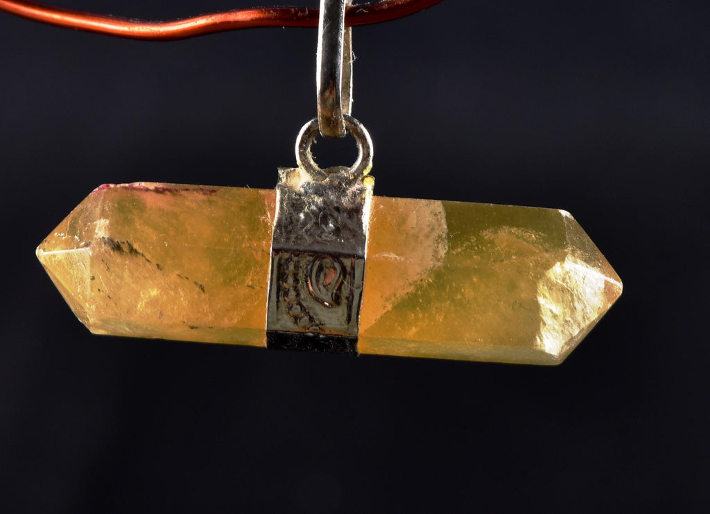 Calcite  Natural  protecting, grounding and centering double terminated pendant   7306