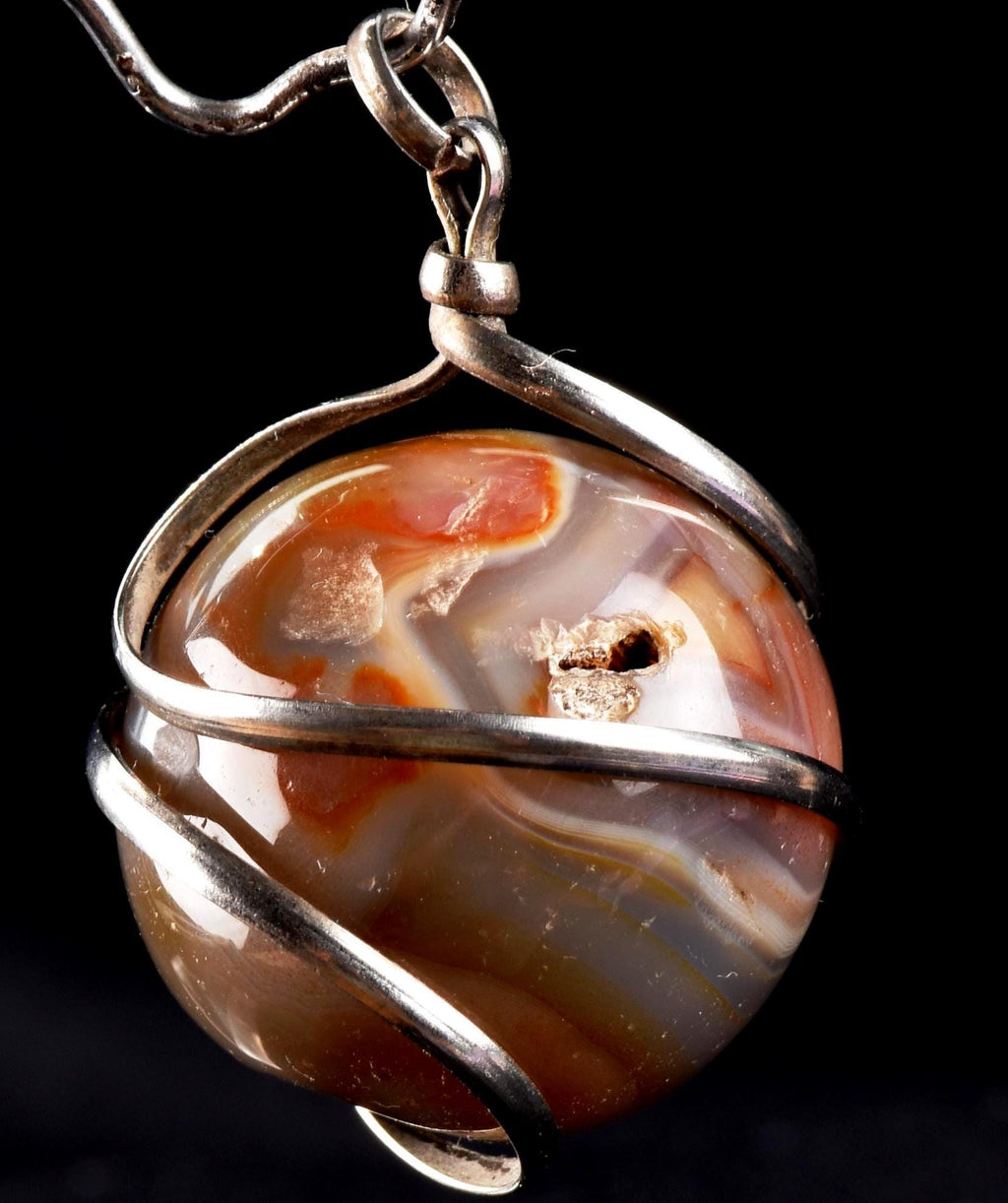 old carnelian sphere with cave   pendant creativity courage protection strength   #7148