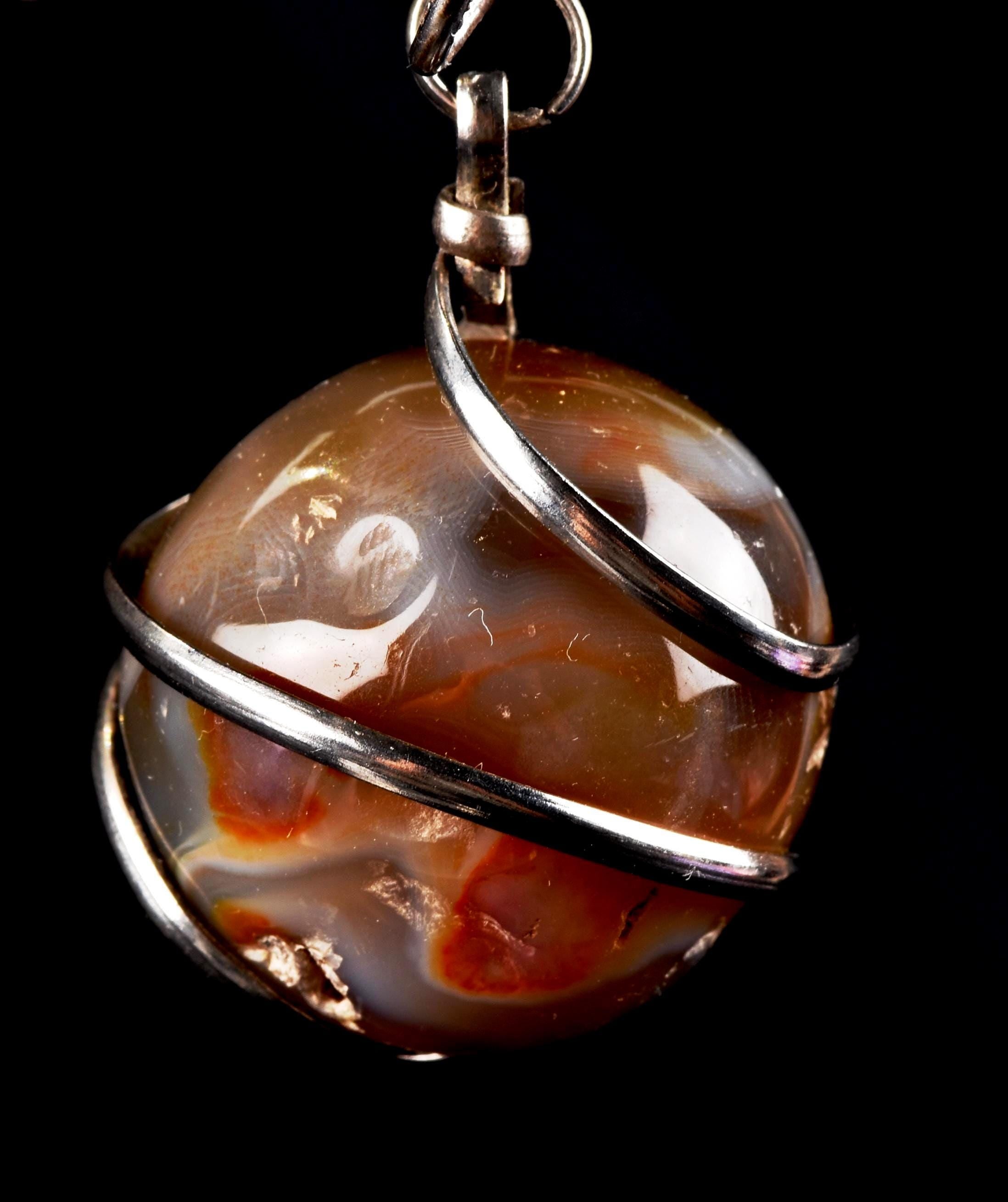 old carnelian sphere with cave   pendant creativity courage protection strength   #7148