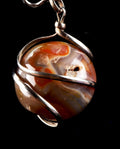 old carnelian sphere with cave   pendant creativity courage protection strength   #7148