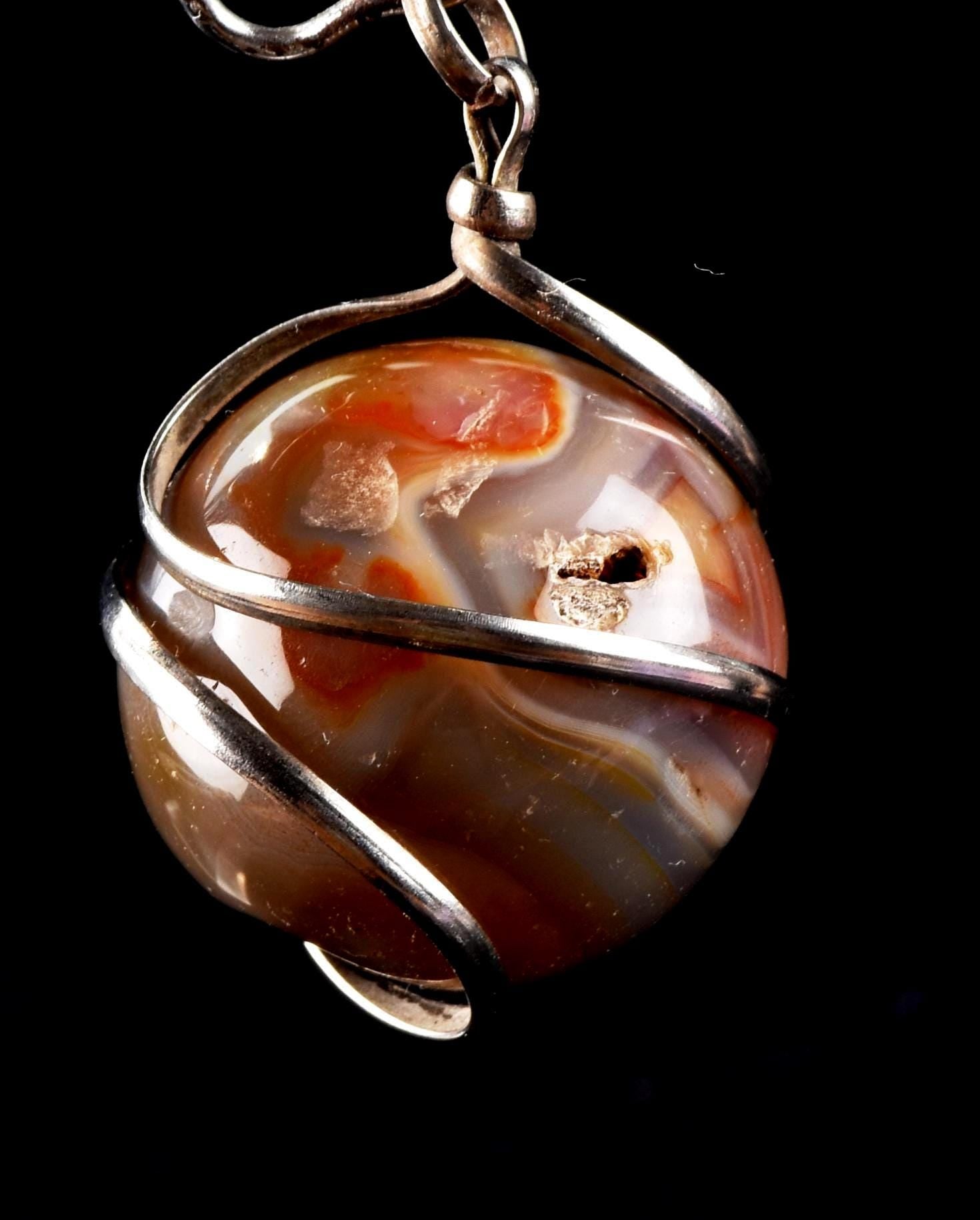 old carnelian sphere with cave   pendant creativity courage protection strength   #7148