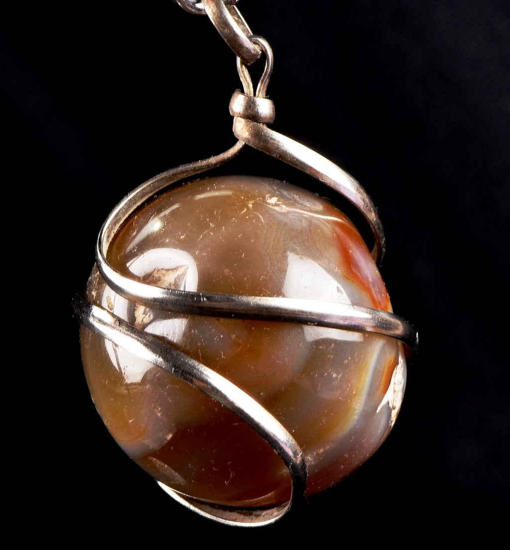 old carnelian sphere with cave   pendant creativity courage protection strength   #7148