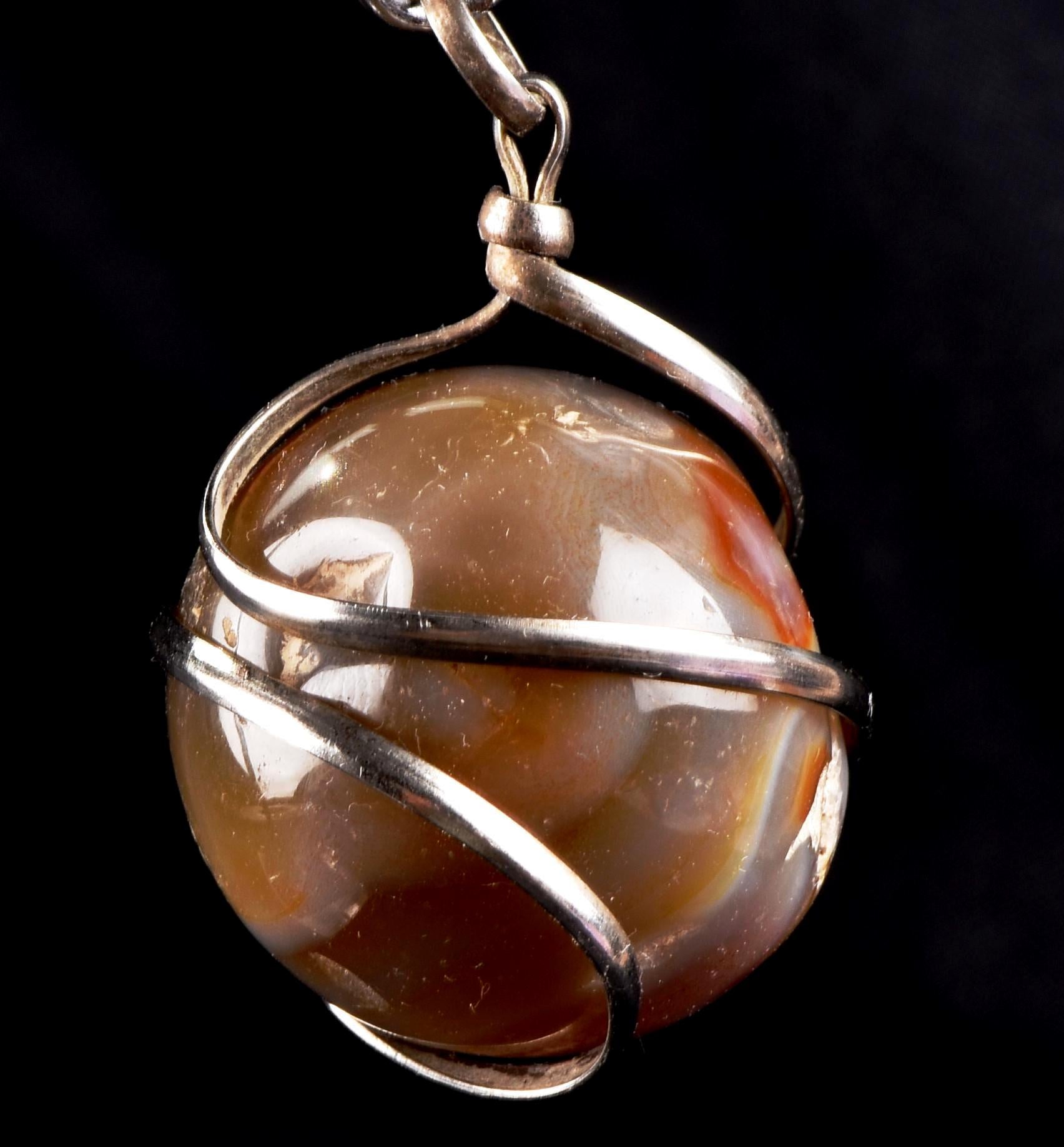 old carnelian sphere with cave   pendant creativity courage protection strength   #7148