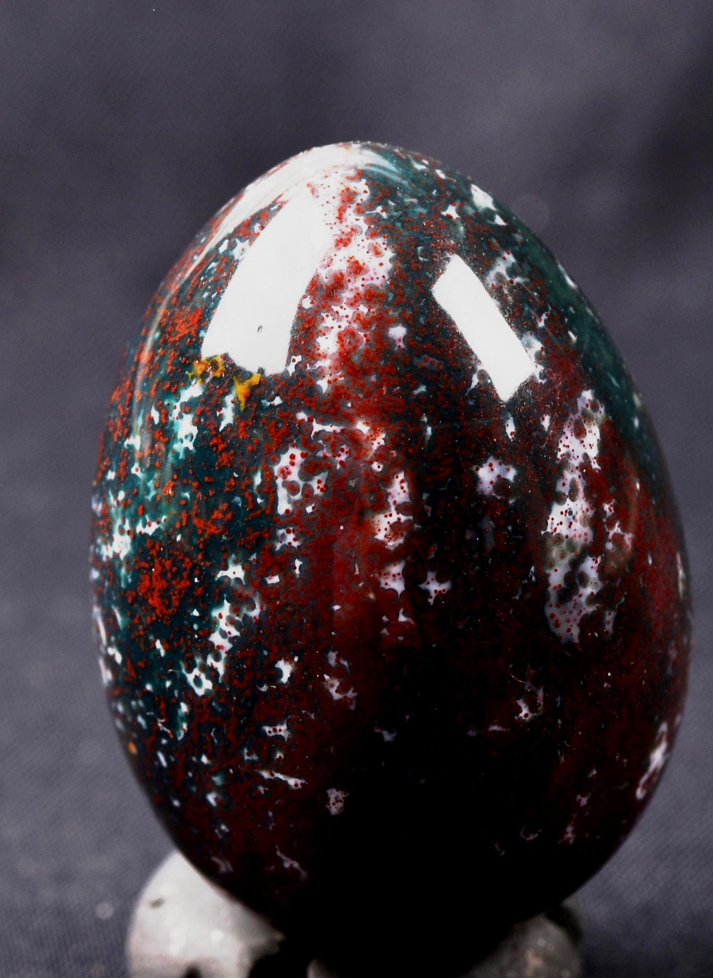 Blood stone  egg  energy and strength ,constant energy flows    grounding negative energy and cleansing the body  8107