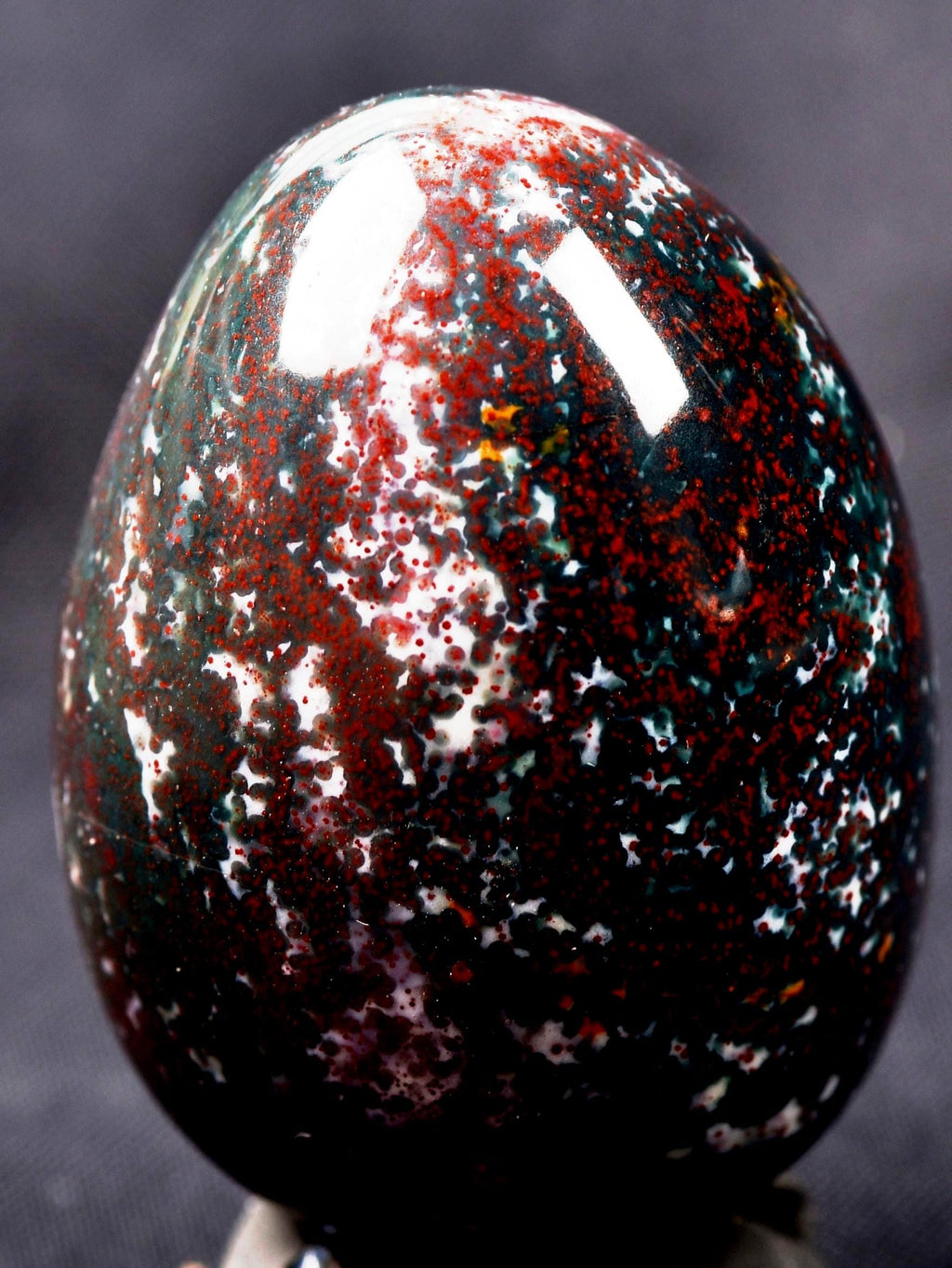 Blood stone  egg  energy and strength ,constant energy flows    grounding negative energy and cleansing the body  8107
