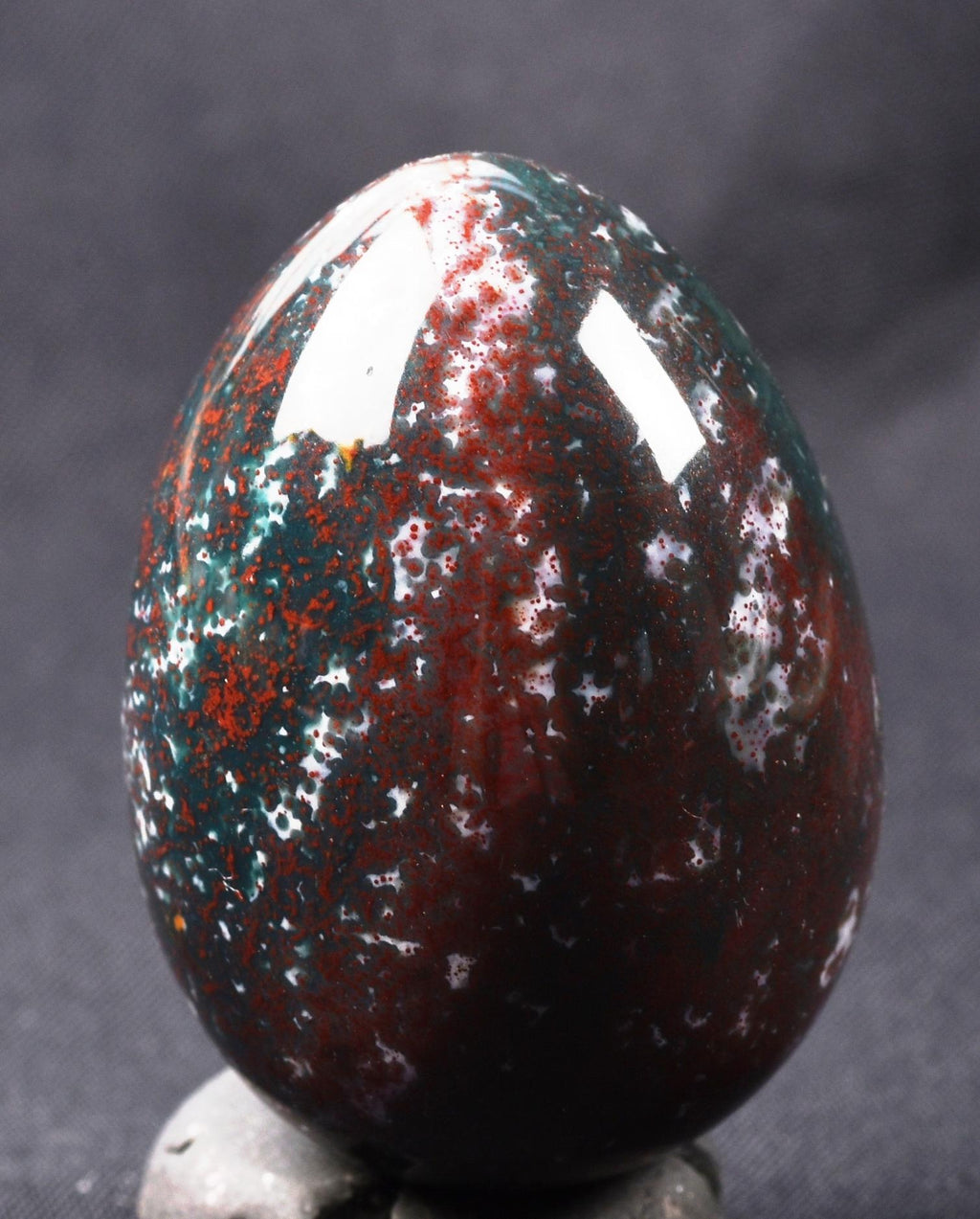 Blood stone  egg  energy and strength ,constant energy flows    grounding negative energy and cleansing the body  8107