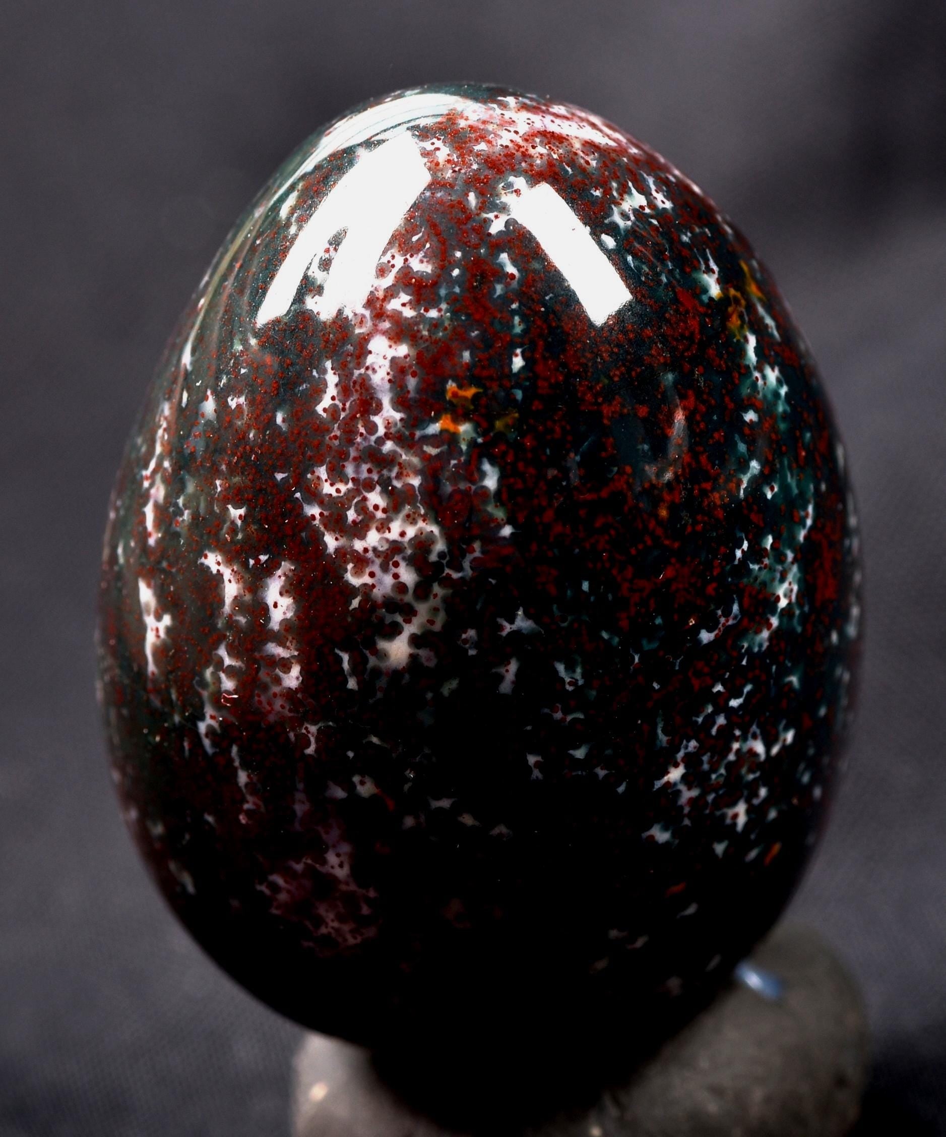 Blood stone  egg  energy and strength ,constant energy flows    grounding negative energy and cleansing the body  8107