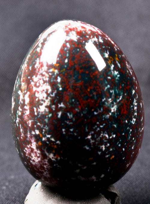 Blood stone  egg  energy and strength ,constant energy flows    grounding negative energy and cleansing the body  8107