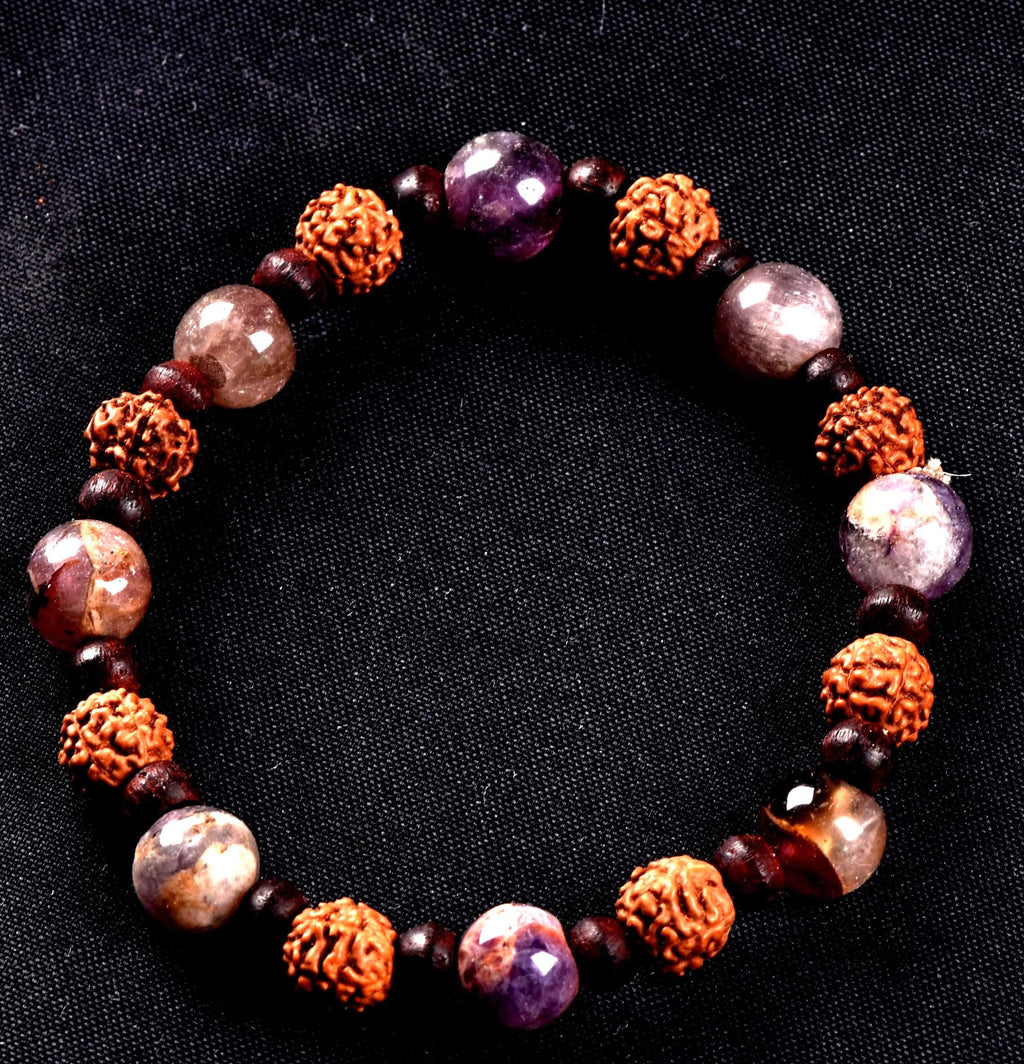 Super seven 7 melody stone bracelet with red sandalwood/rudrakha beads Purifies, balances energizes all of the Chakras and Auric bodies 7077