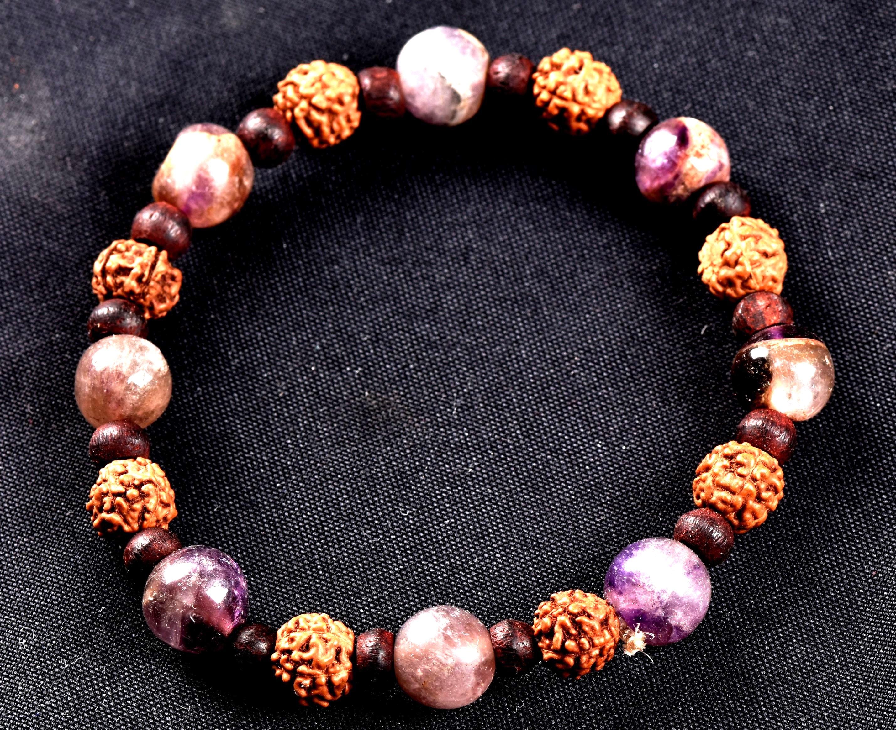 Super seven 7 melody stone bracelet with red sandalwood/rudrakha beads Purifies, balances energizes all of the Chakras and Auric bodies 7077