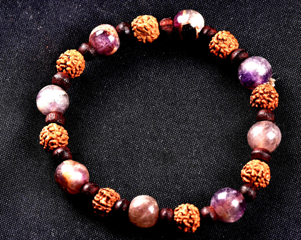 Super seven 7 melody stone bracelet with red sandalwood/rudrakha beads Purifies, balances energizes all of the Chakras and Auric bodies 7077