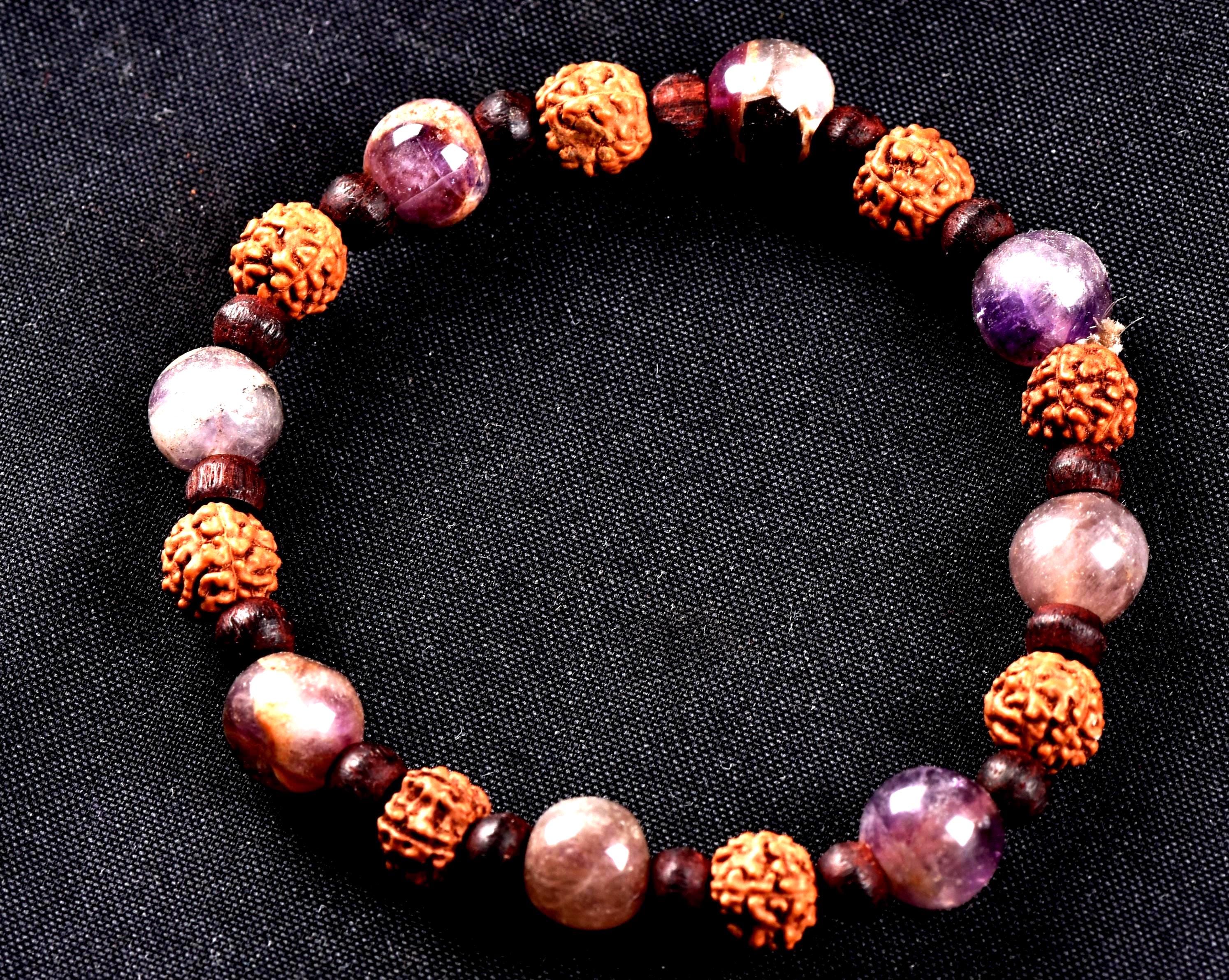 Super seven 7 melody stone bracelet with red sandalwood/rudrakha beads Purifies, balances energizes all of the Chakras and Auric bodies 7077