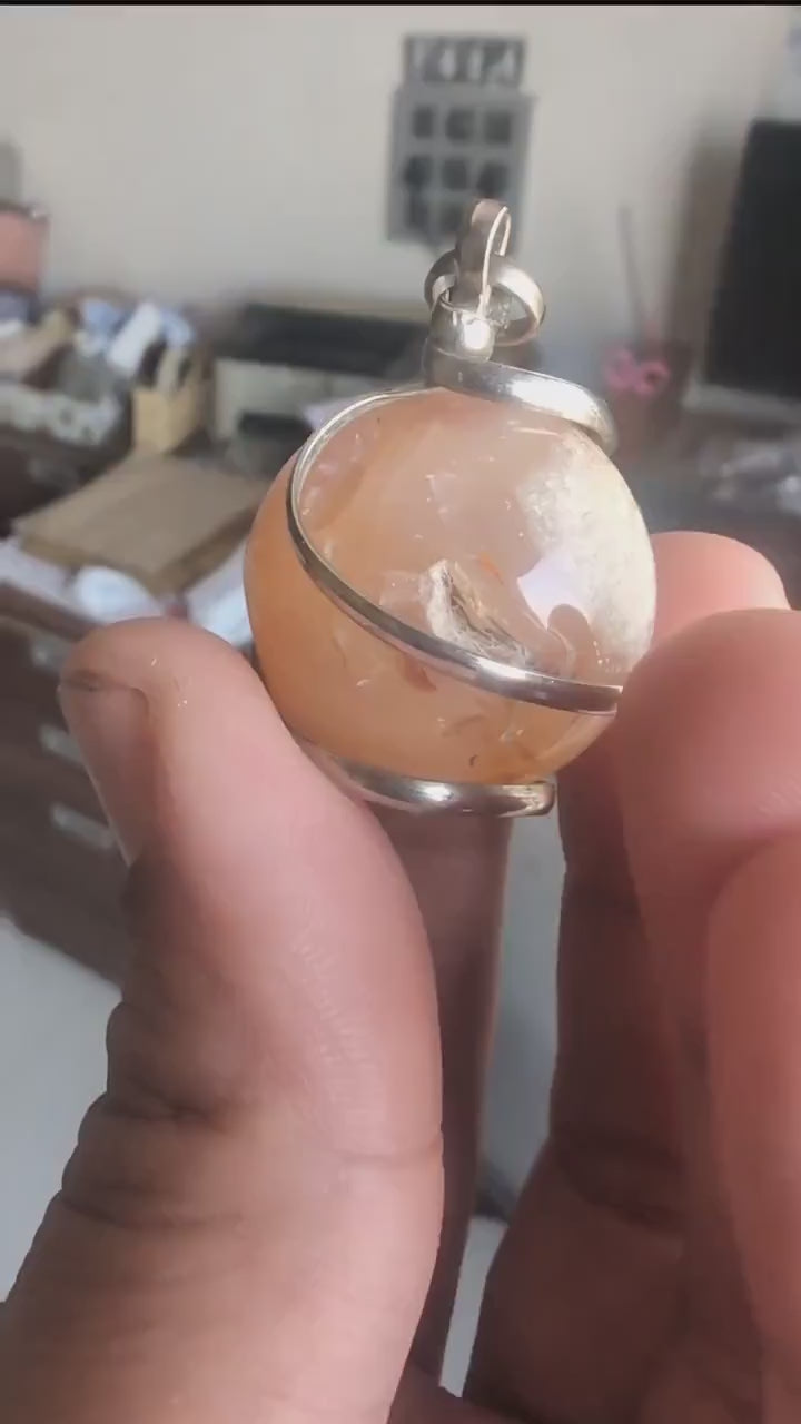 old carnelian sphere with cave   pendant creativity courage protection strength   #7148